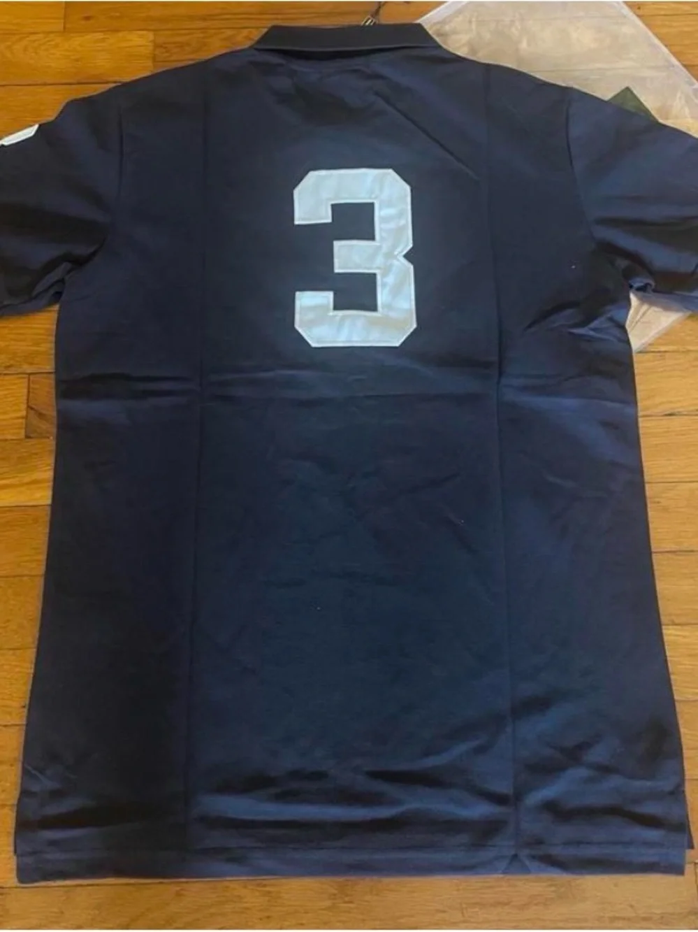 Ralph Lauren Navy Polo Shirt with White Logos and Gold Crest